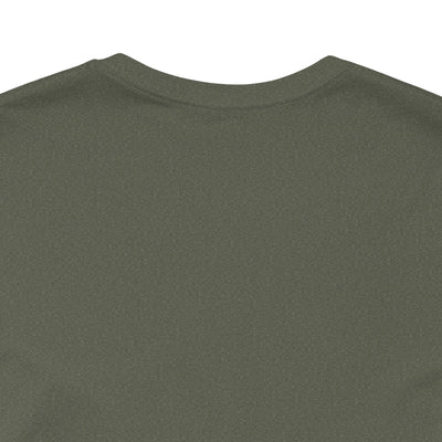 A close-up of a dark green t-shirt with a textured knit.