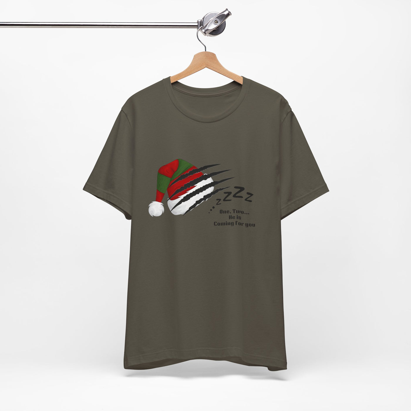 A dark green t-shirt with a graphic of a Santa hat with claw marks and "Zzz" text.
