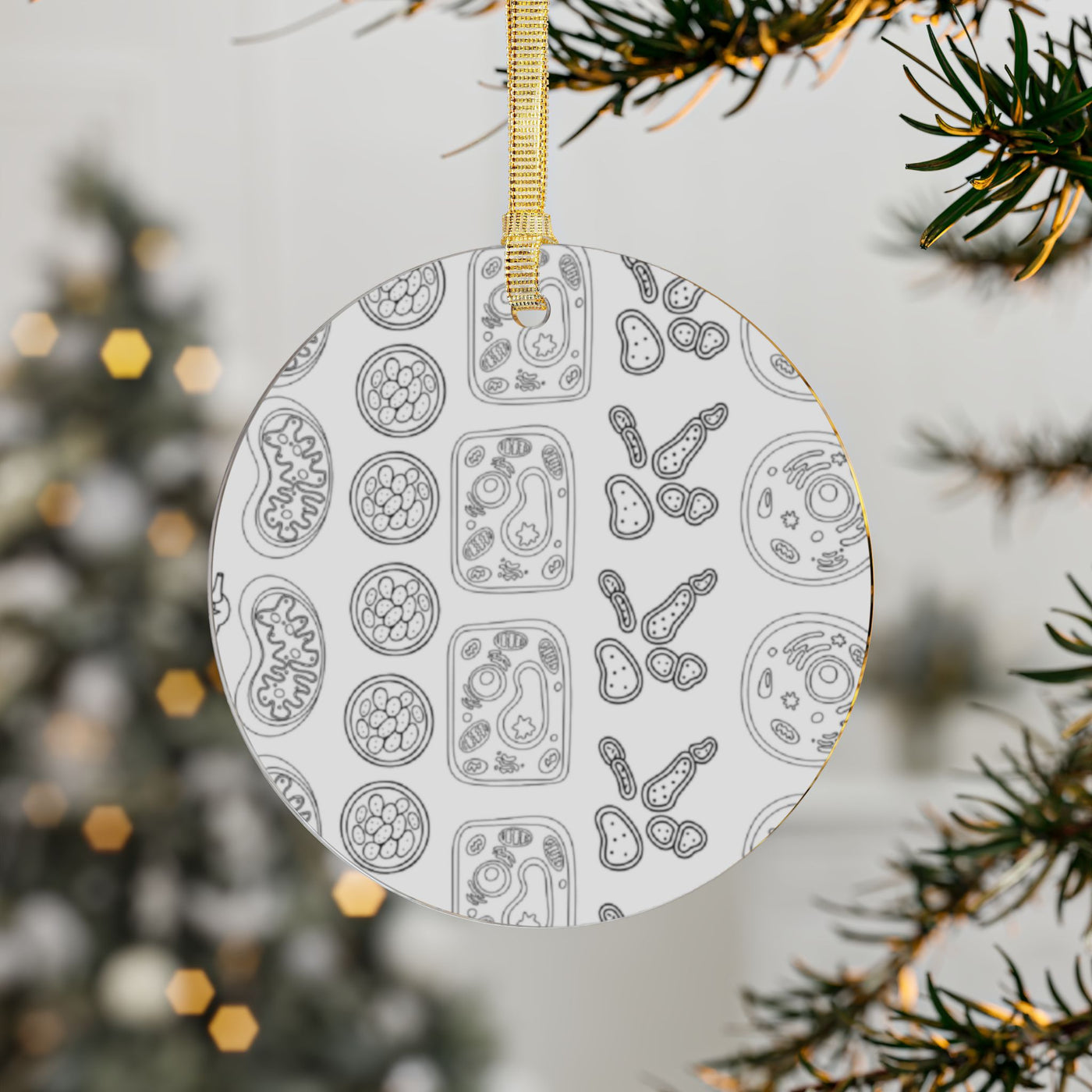 Round acrylic ornament with a pattern of scientific cell drawings.