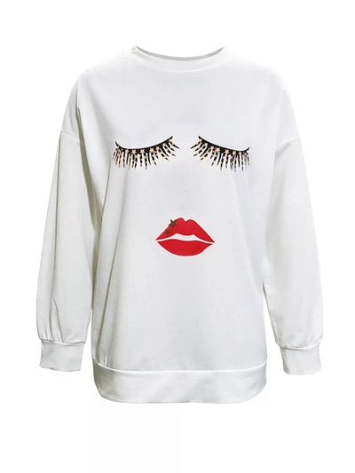 White graphic t-shirt with closed eyes and red lips design.