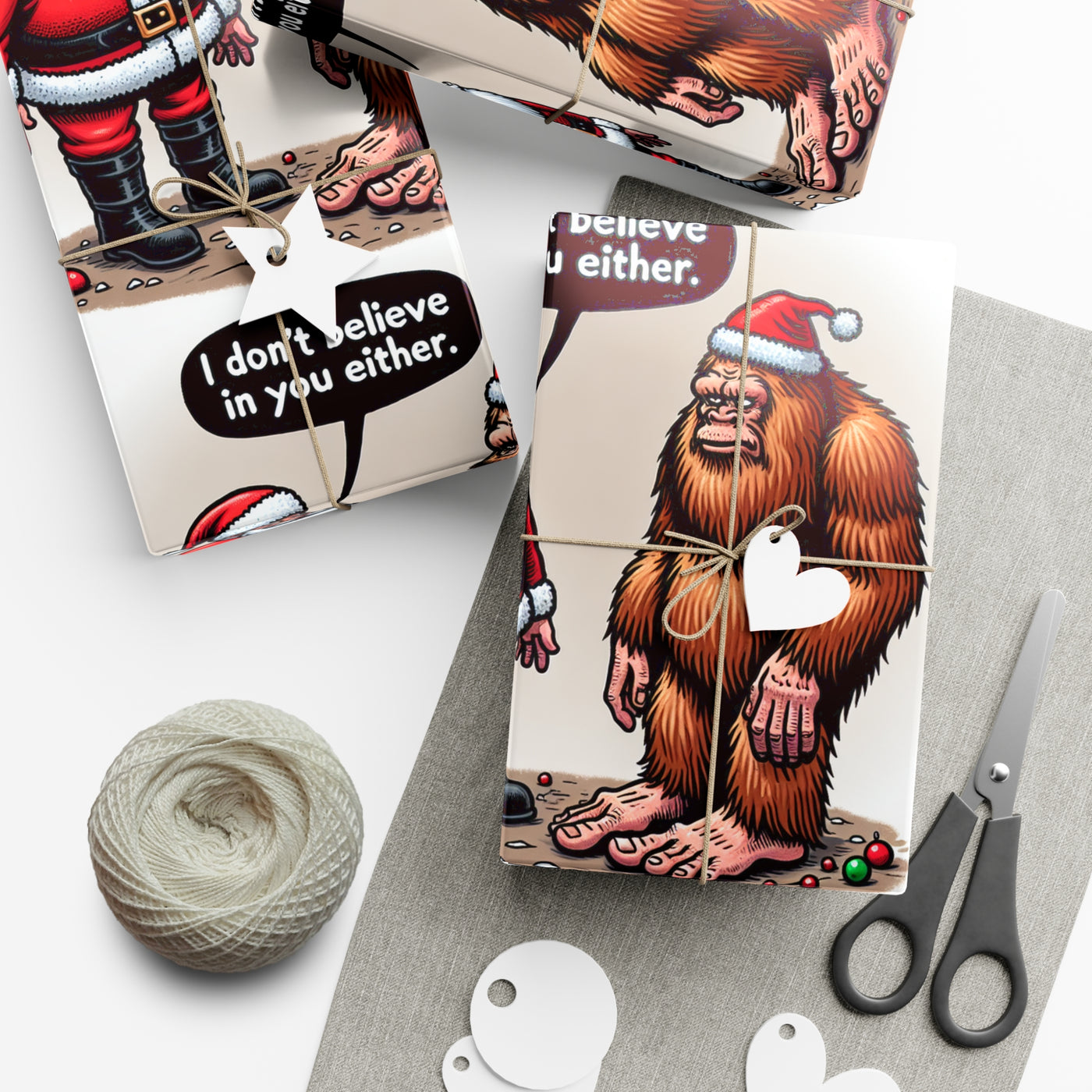Wrapping paper with Santa and Bigfoot illustrations and humorous text.