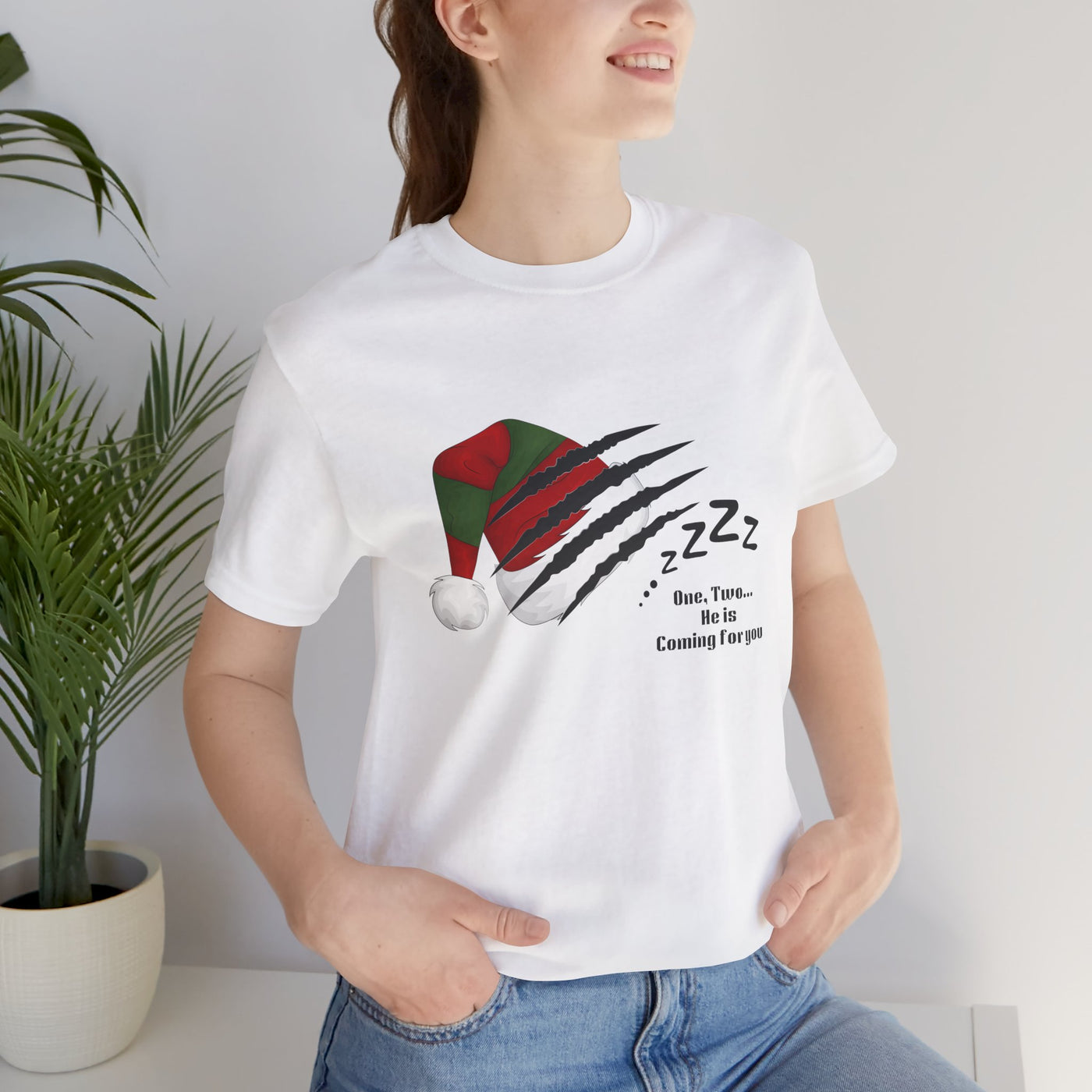 Unisex white t-shirt with a Nightmare on Elm Street holiday graphic.