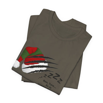 A grey t-shirt with a graphic of Freddy Krueger's glove tearing through a Santa hat.