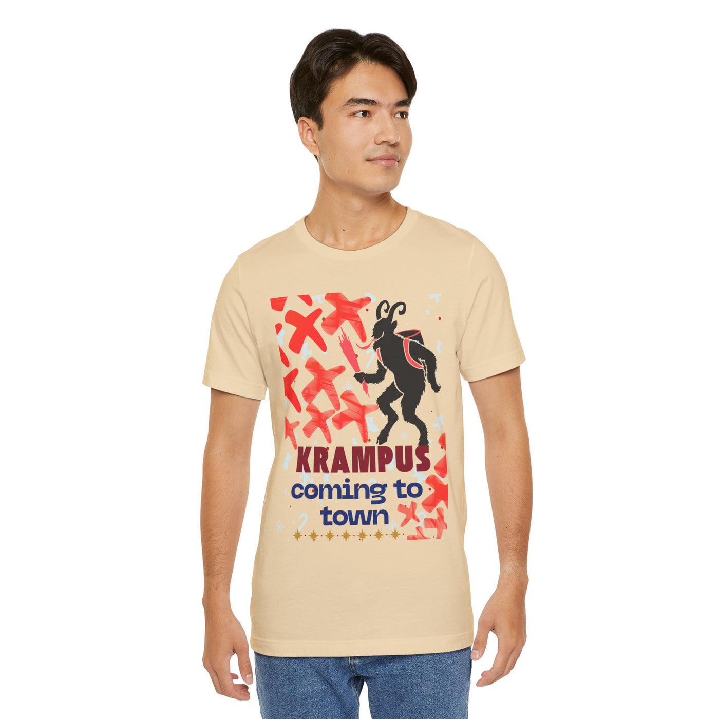 A man wears a tan t-shirt with a Krampus graphic and text.