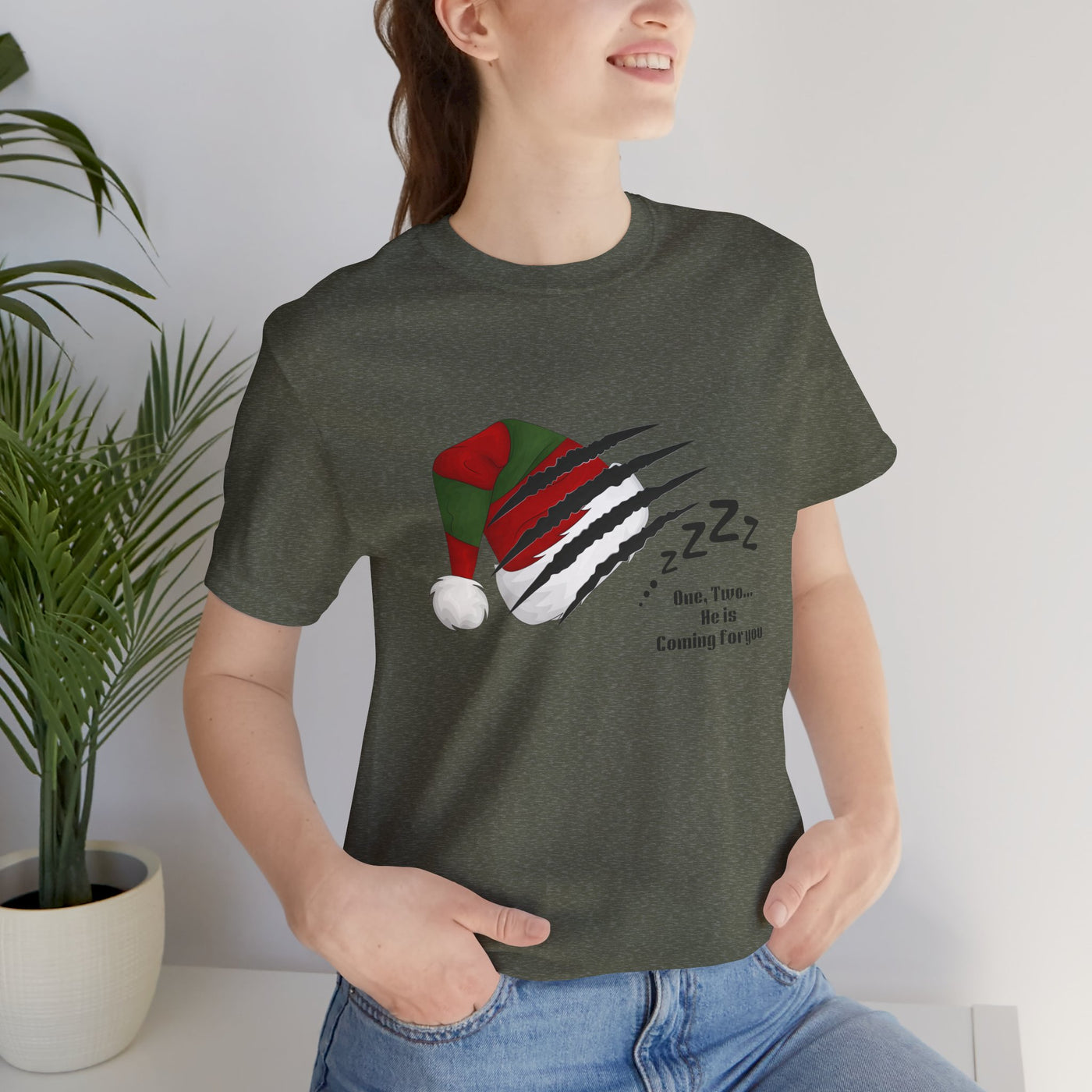 Unisex t-shirt with a Nightmare on Elm Street holiday graphic.
