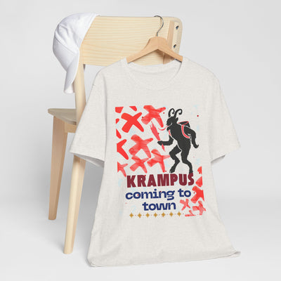 A white t-shirt with a Krampus graphic and text.