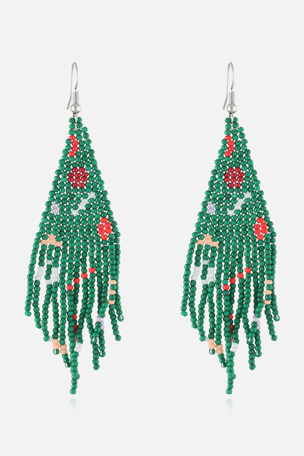 Green beaded Christmas tree earrings with red and white accents.