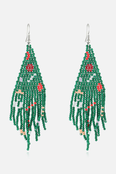 Green beaded Christmas tree earrings with red and white accents.