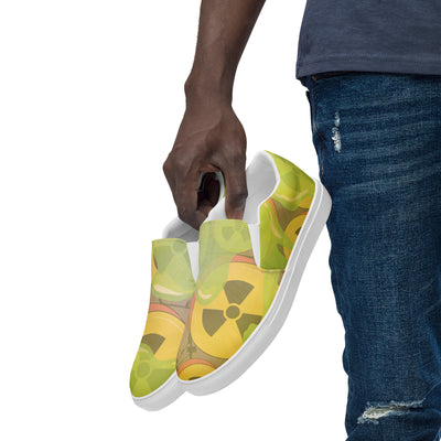 Apocalyptic Nuclear Waste Slip-on Canvas Shoes with bold radioactive-inspired design, durable sole, and breathable canvas for streetwear style.