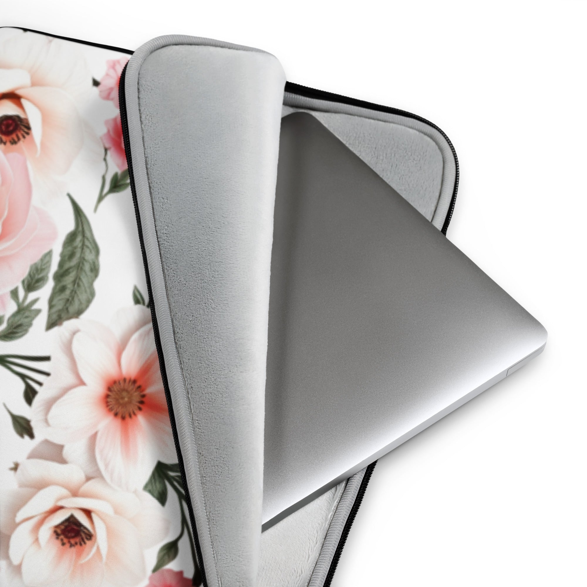 Floral print laptop sleeve with zipper, padded interior, and slim design for stylish laptop protection.