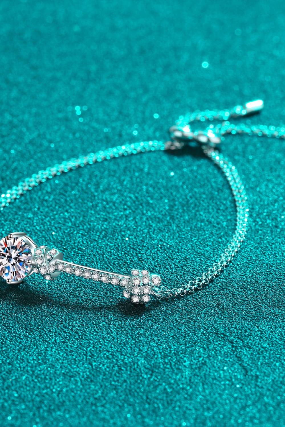 A minimalist 2 carat moissanite bracelet in 925 sterling silver.