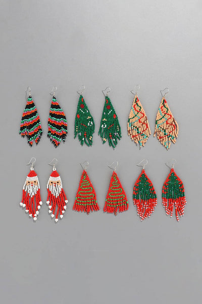 Twelve pairs of beaded earrings in Christmas tree and Santa designs.