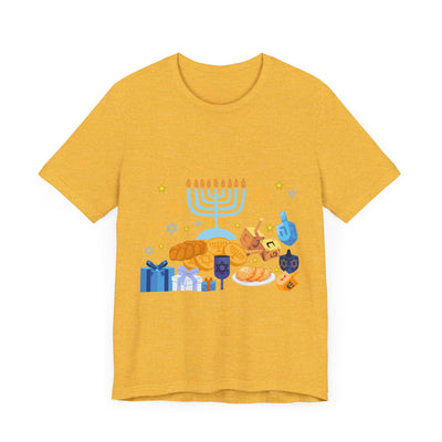 Yellow t-shirt with a graphic of Hanukkah symbols.