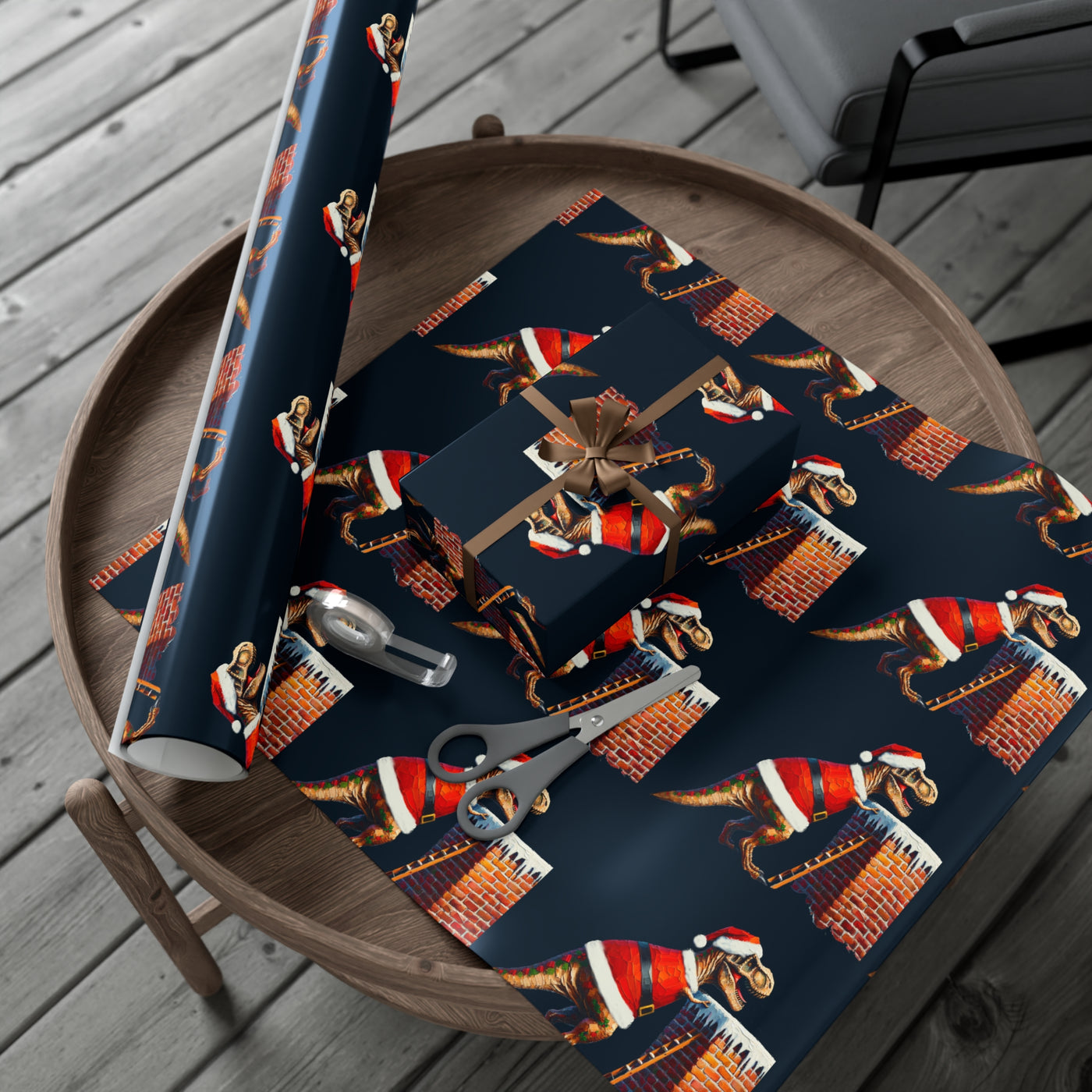 Gift wrap with a dark blue background featuring a repeating pattern of T-Rex dinosaurs in Santa outfits climbing down chimneys.
