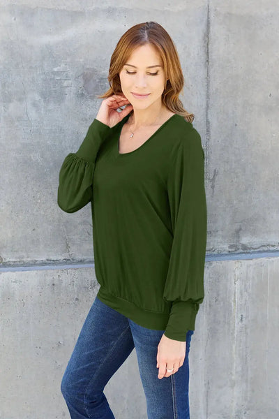 Women's olive green v-neck top with lantern sleeves.