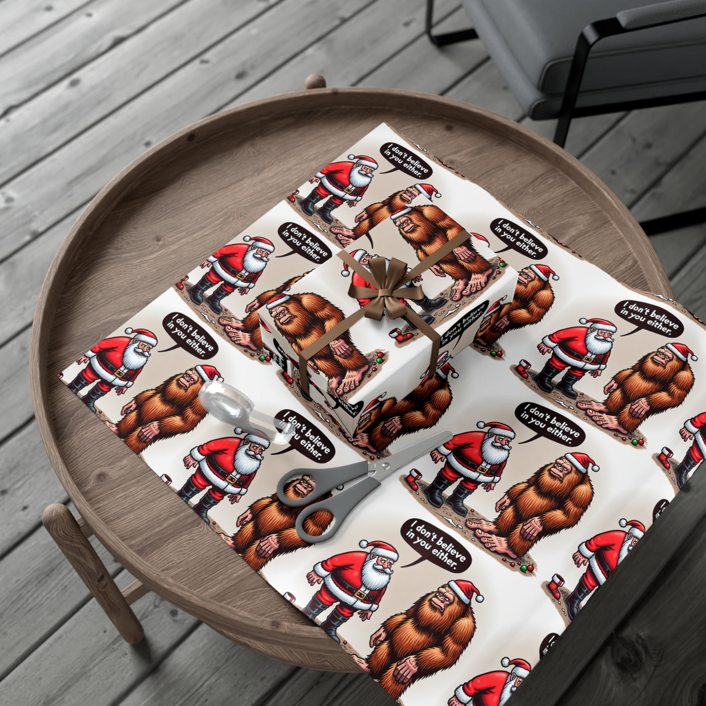 Wrapping paper with Santa and Bigfoot illustrations and the text "I don't believe in you either."