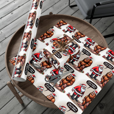 Wrapping paper with Santa and Bigfoot designs.