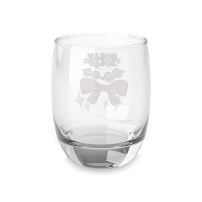 Holly Jolly Cherry Skulls whiskey glass with a bow and stars design.