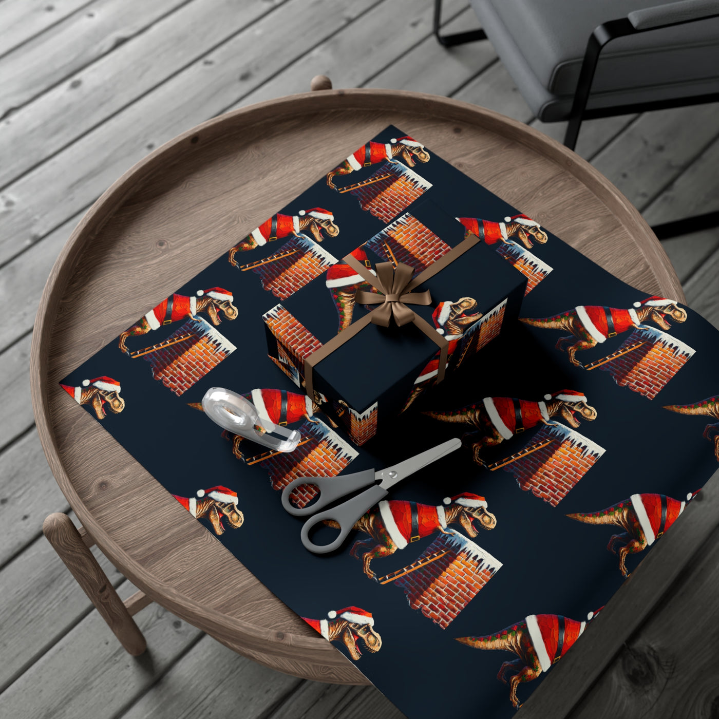 Gift wrap with a dark background featuring a repeating pattern of T-Rex dinosaurs in Santa hats climbing chimneys.