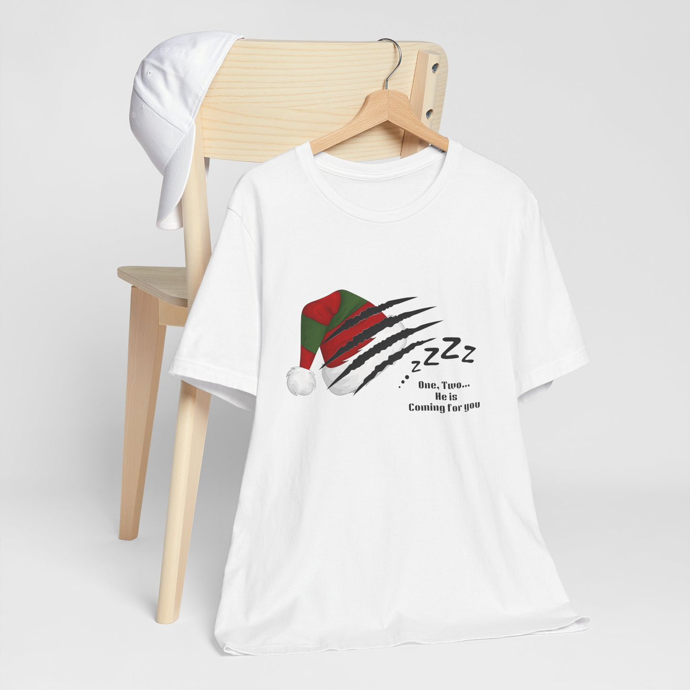 White unisex t-shirt with a Nightmare on Elm Street holiday graphic.