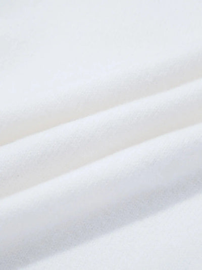 White knit fabric with soft folds.