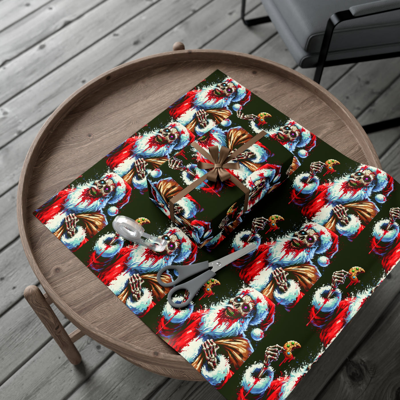 Zombie Santa wrapping paper with a gift, scissors, and tape on a wooden table.