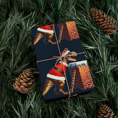 Gift wrap with a T-Rex in a Santa suit climbing a chimney, surrounded by pine needles and pinecones.