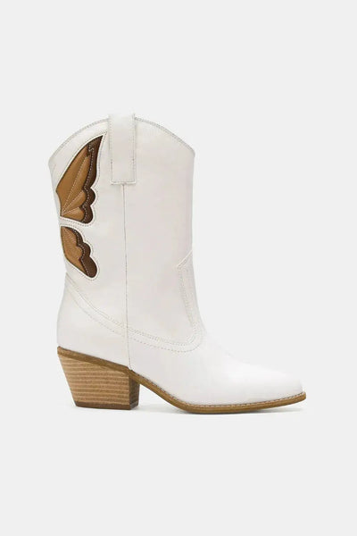 White PU leather cowboy boots with butterfly cut-out details and a pointed toe.