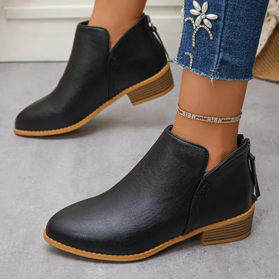 Black PU leather pointed toe block heel booties with a side zipper.