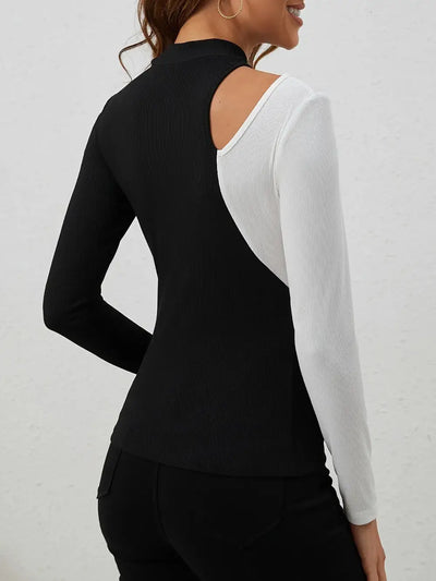 Black and white long sleeve t-shirt with a cutout and mock neck.