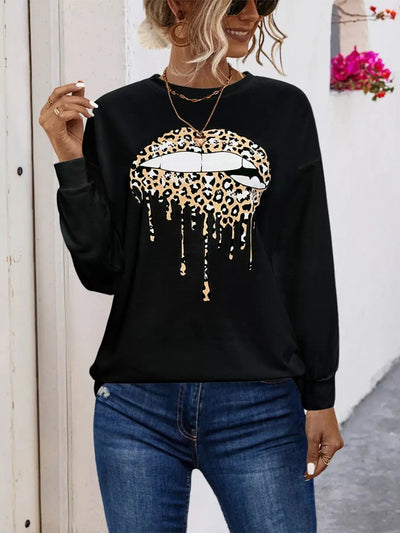 Black graphic t-shirt with a leopard print dripping lips design.