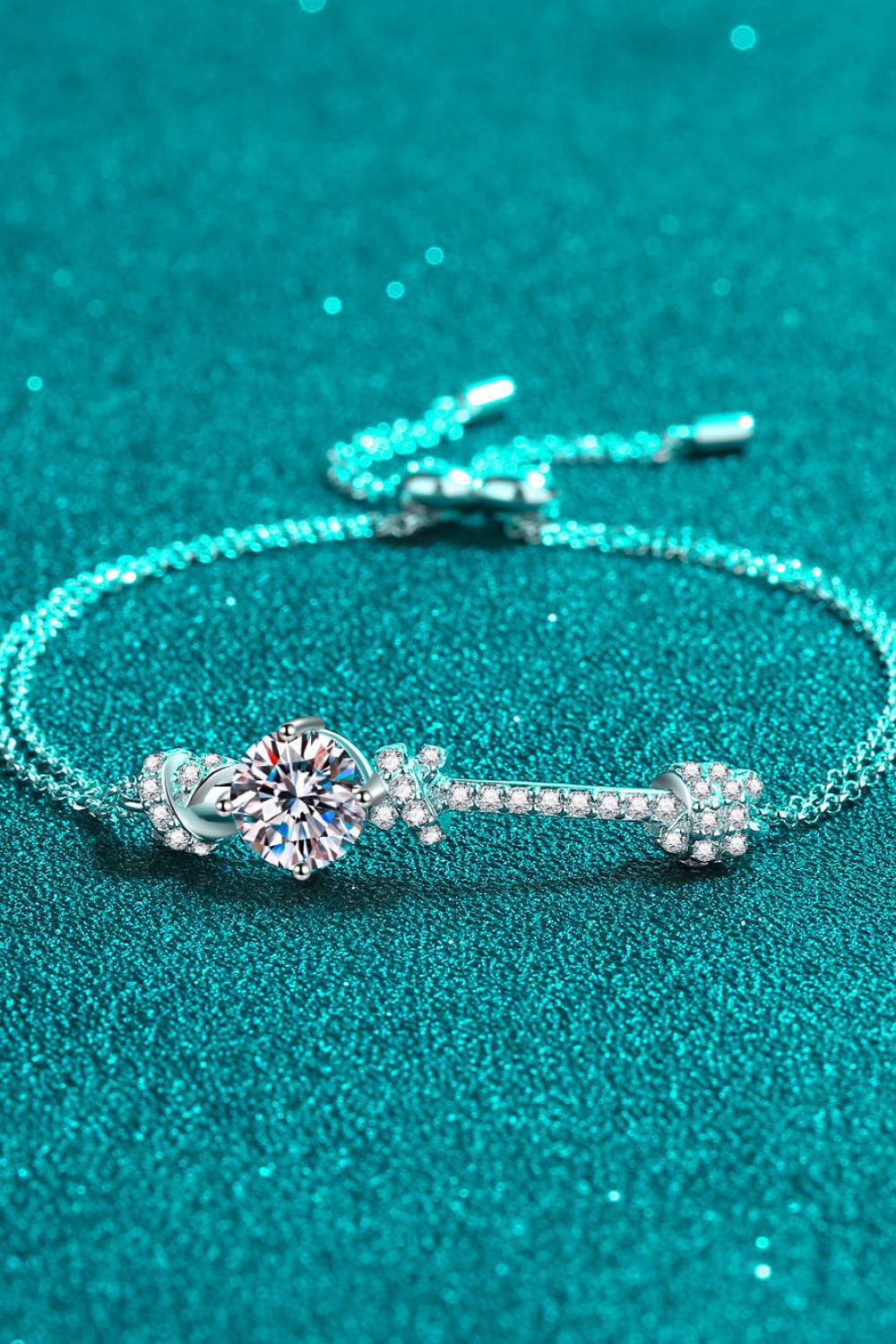 A minimalist 2-carat moissanite bracelet in 925 sterling silver.